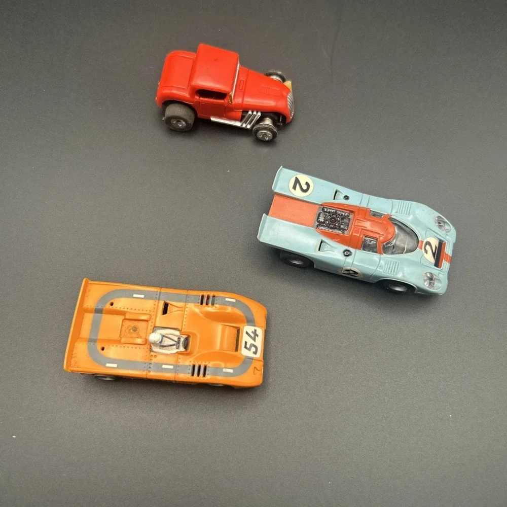 AURORA MCLAREN  AFX RARE TEAL BLUE #54  & YELLOW FERRARI CAN AM HO SLOT CAR #15
